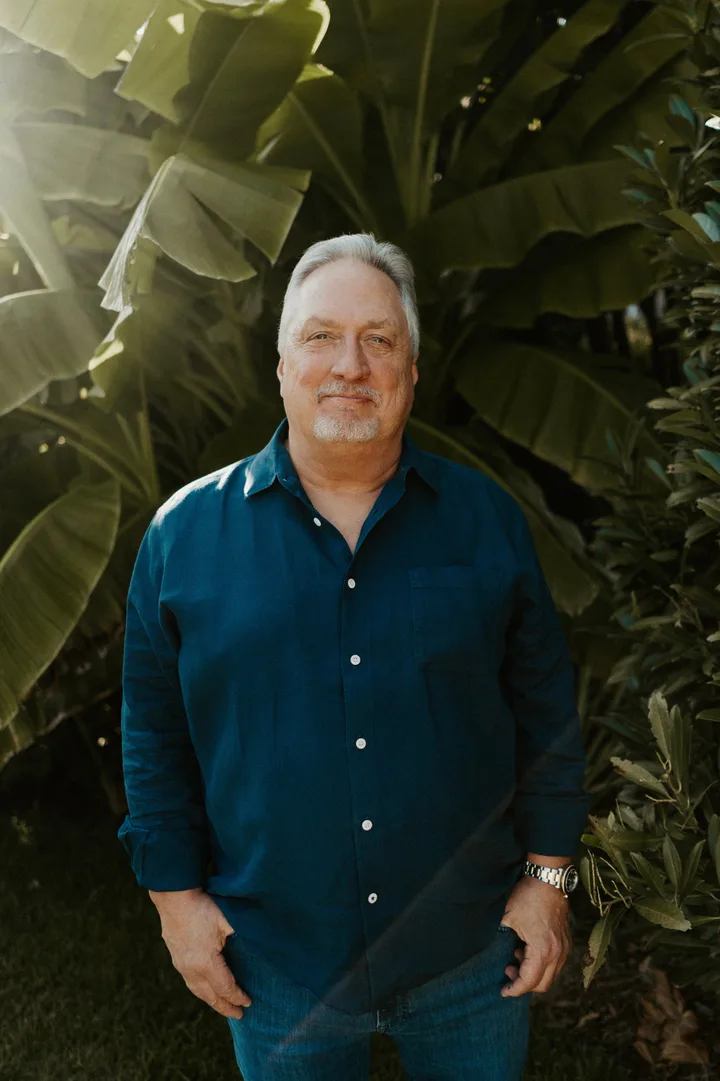 Daniel P. Smith, founder of TALORA Destinations, photographed outdoors.